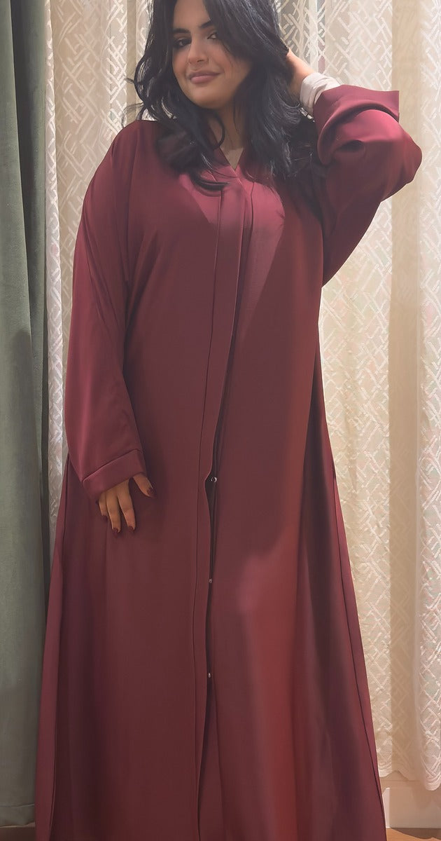 عباية ساتان بلون خمري أنيق – فخامة ناعمة تليق بكِ